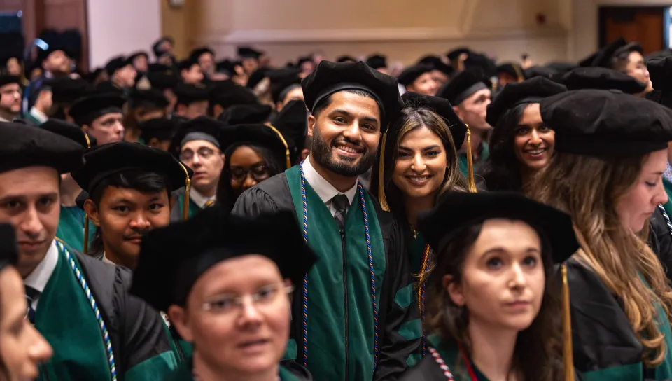 Hammad and Hafsa Sadiq smile at graduation
