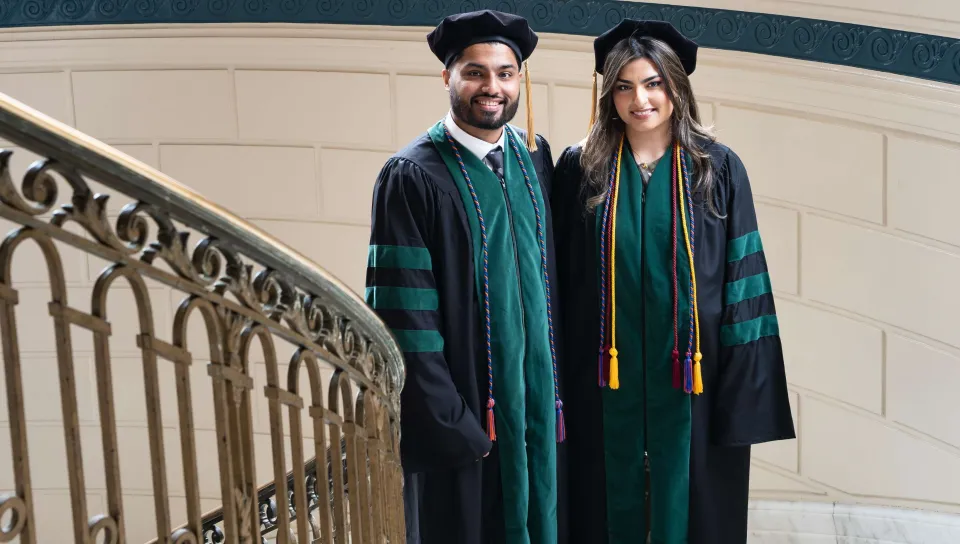 Hafsa and Hammad Saddiq pose for a portrait inside Portland City Hall