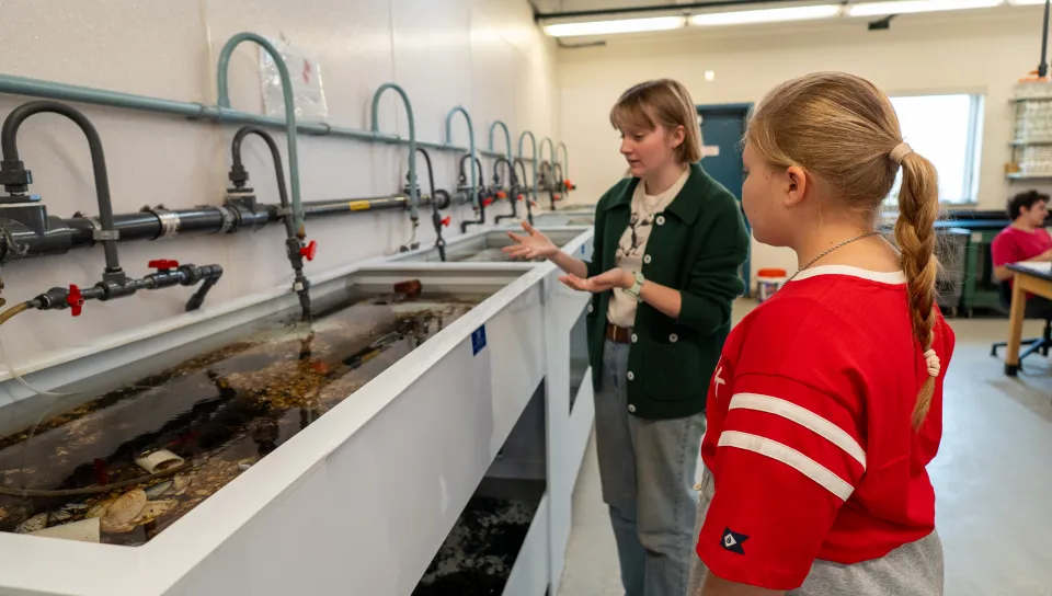 Assistant Professor Tricia Thibodeau and third-year marine science major Piper Stagg took time to lead a private tour of the Arthur P. Girard Marine Science Center for a 10-year-old aspiring researcher, carrying on a legacy of discovery throughout the next generation of scientists.