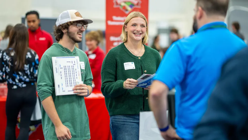 Students speak with job recruiters