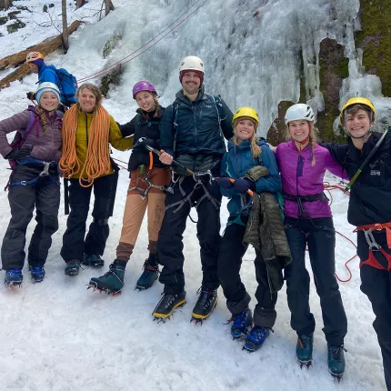 A group shot of U N E students at an ice climbing outing