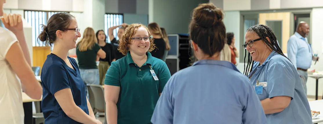 A group of interprofessional students touring the Maine Department of Corrections facility and learning about health care for inmates