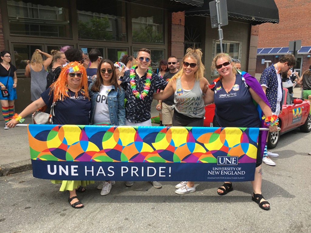 UNE COM students march in Portland, Maine's pride parade