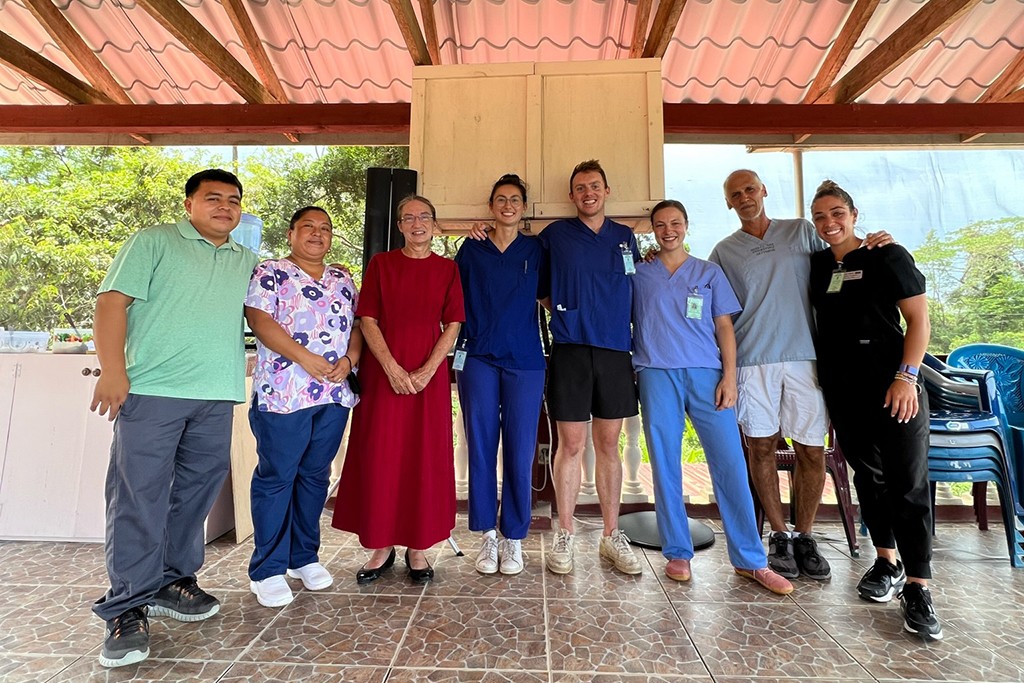 Group shot of Ana Maria Castellanos and other physical therapy students in Belize