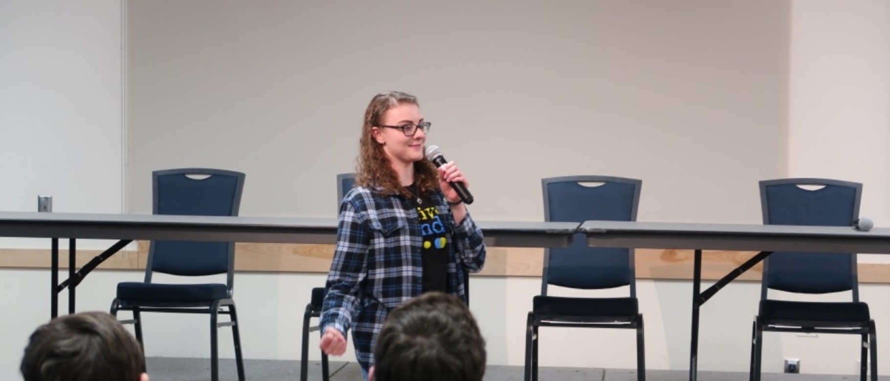 Sydney Wolf leads a discussion at an Active Minds event in 2019