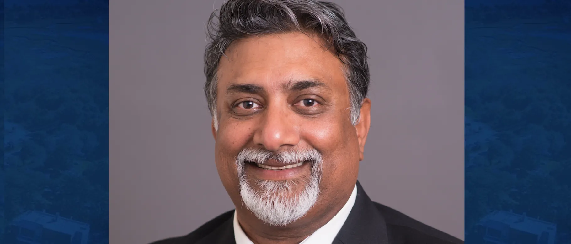 Head shot photo of Kash Dutta