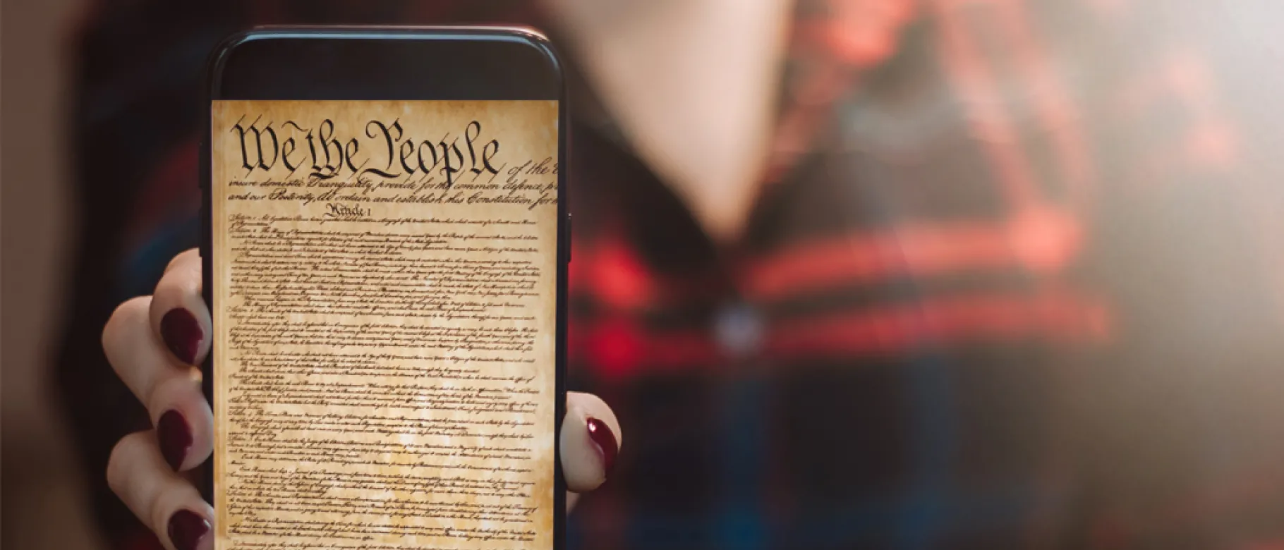 The U.S. Constitution is shown on a smartphone