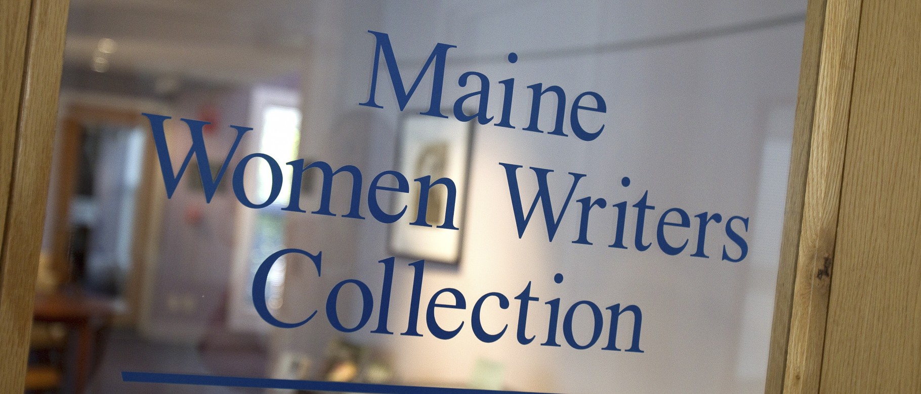 Image of door displaying Maine Women Writers Collection sign