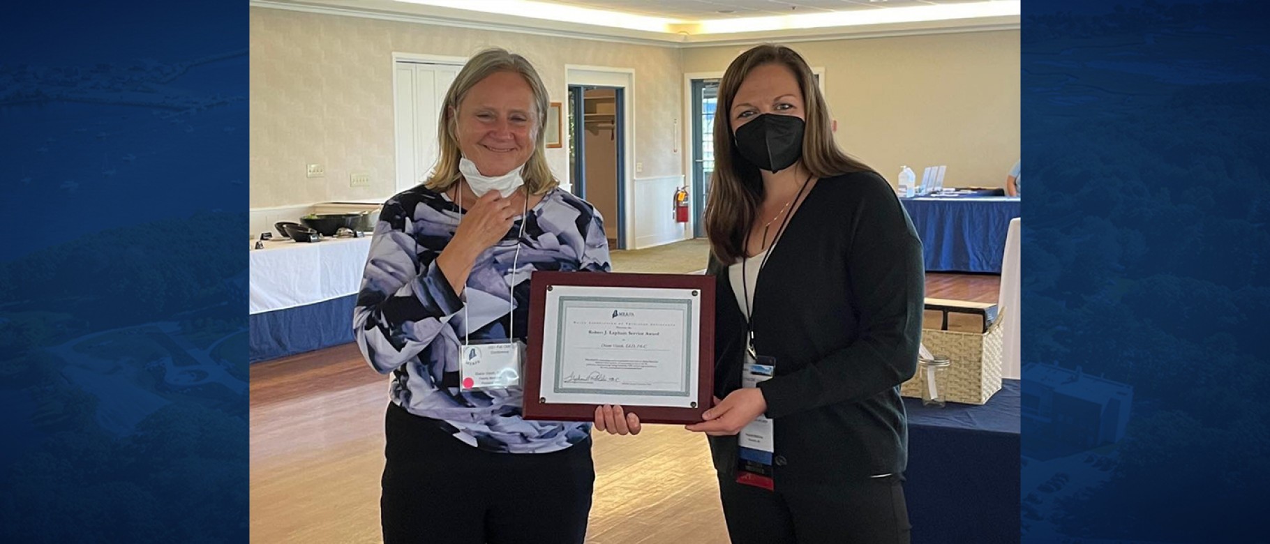 Diane Visich accepts an award from the Maine Academy of Physician Assistants