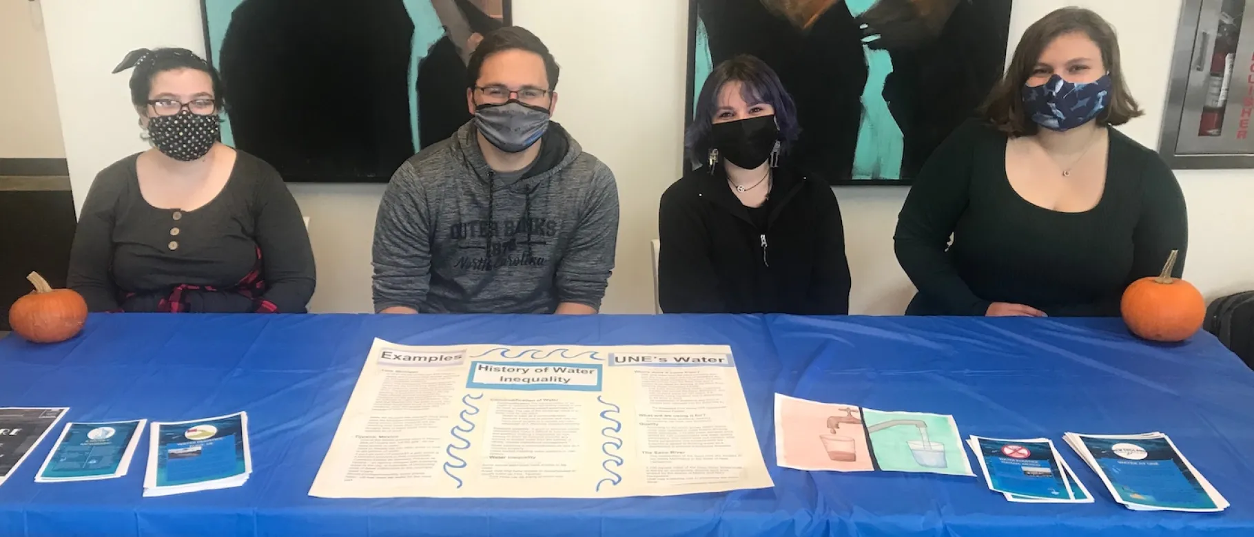 Students at Environmental Justice Fair table