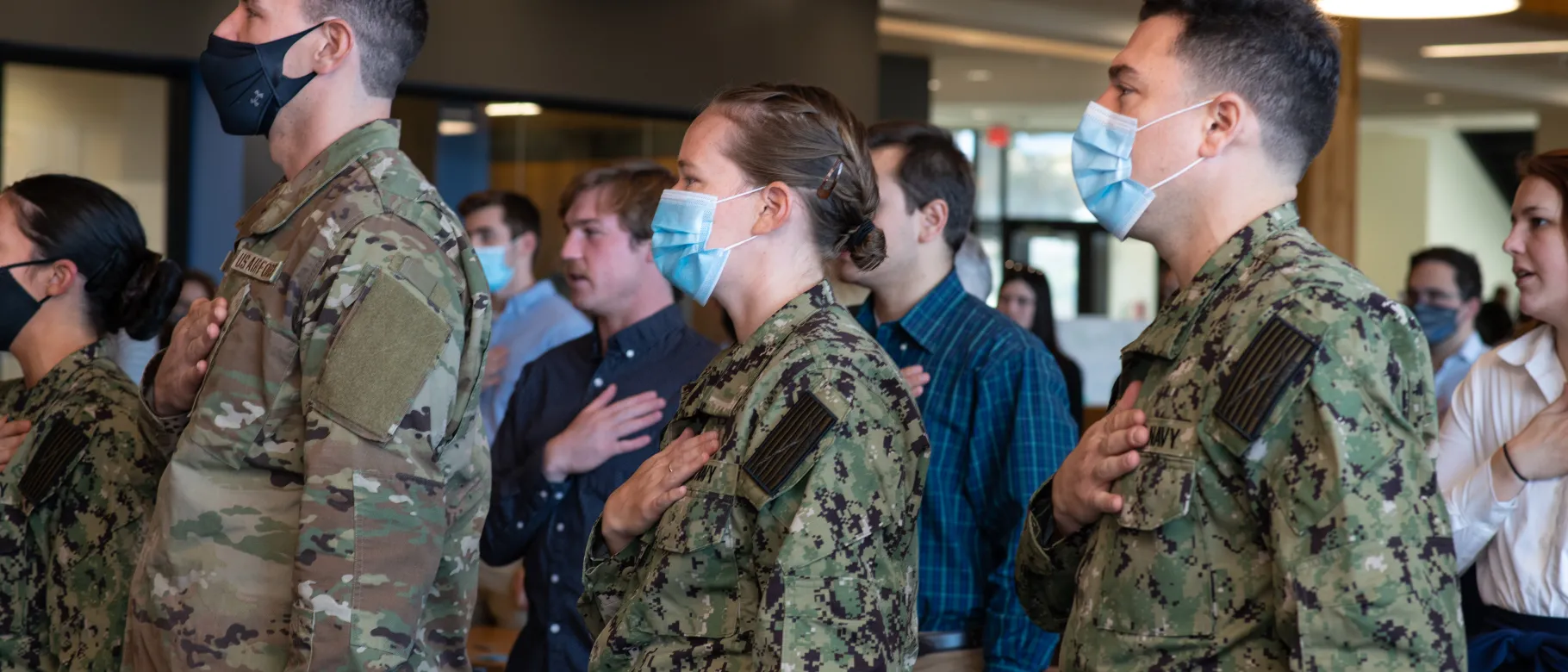 ROTC students pledge allegiance to the flag
