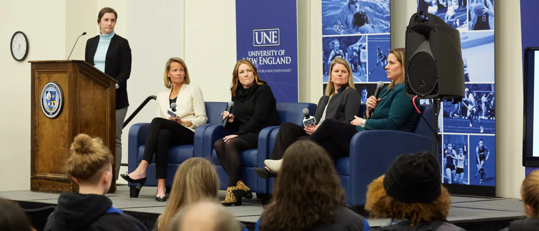 A panel of women sports figures - Emma Tiedemann, Reagan Carey, Abigail Thelin, Heather Davis, and Angela Ruggiero
