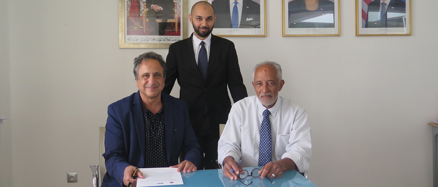 Anouar Majid and CAS Director John Randolph signed the agreement in the presence of Mr. Omar Laafoura, the chair of CAS' board of trustees.