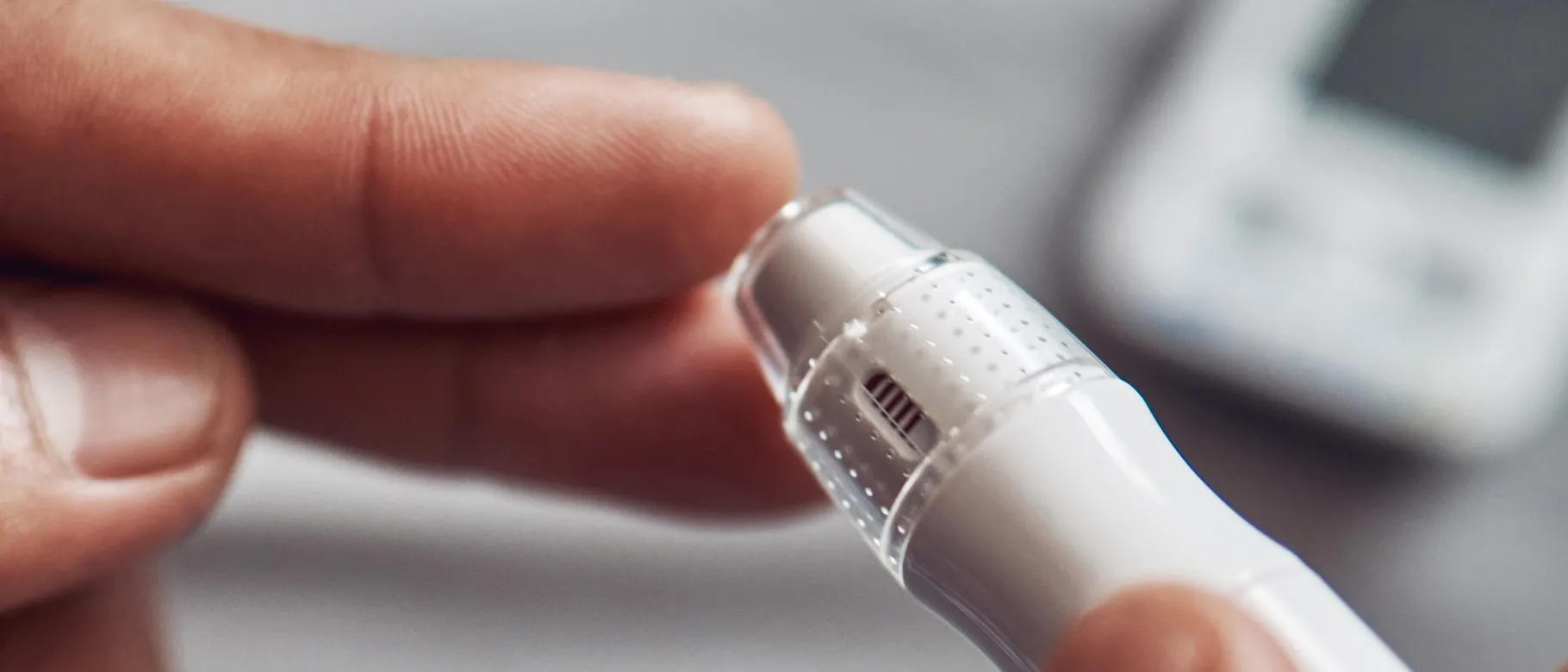 Image of a finger poke for blood sugar screening