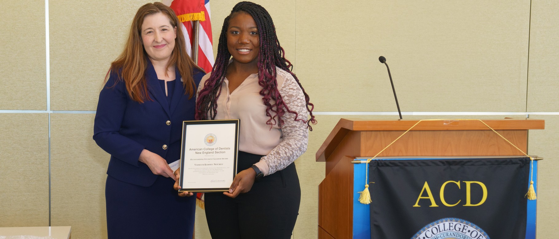 College of Dental Medicine Dean Nicole Kimmes, D.D.S., poses with Class of 2023 student Vasseur “Doria” Kamseu Noukeu, who was presented with the ACD Outstanding Student Leadership Award. 