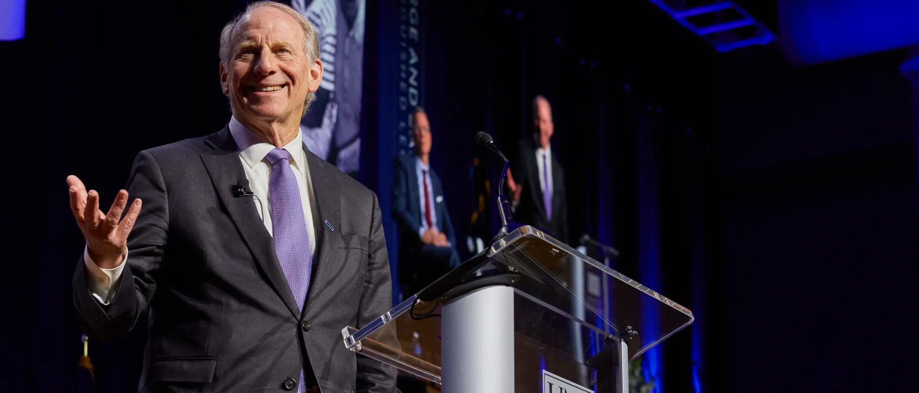 Richard Haass stands onstage