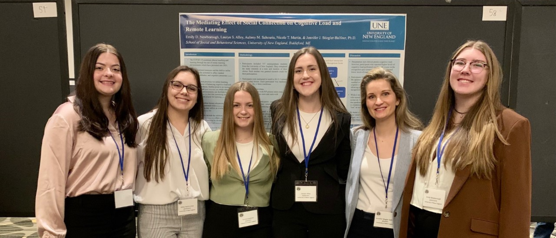 Five women students and a professor pose at the Eastern Psychological Association conference