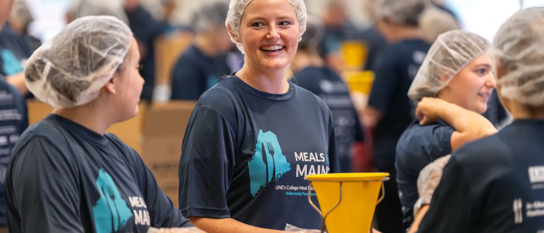 Meals for Maine volunteers prepare meal kits on Sept. 18 to help combat food insecurity.