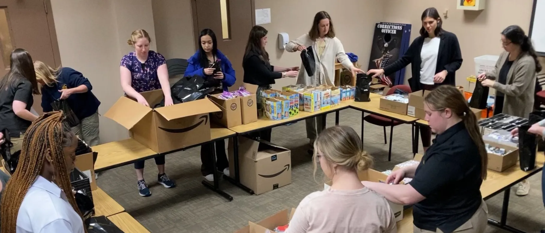 Students assemble harm reduction kits at the Cumberland County Jail