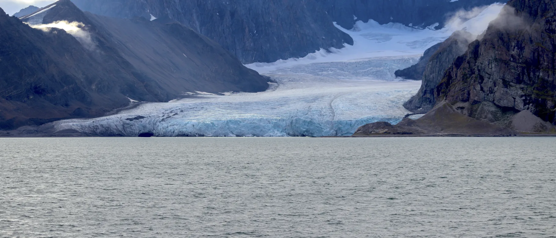 A glacier meets the ocean in Greenland
