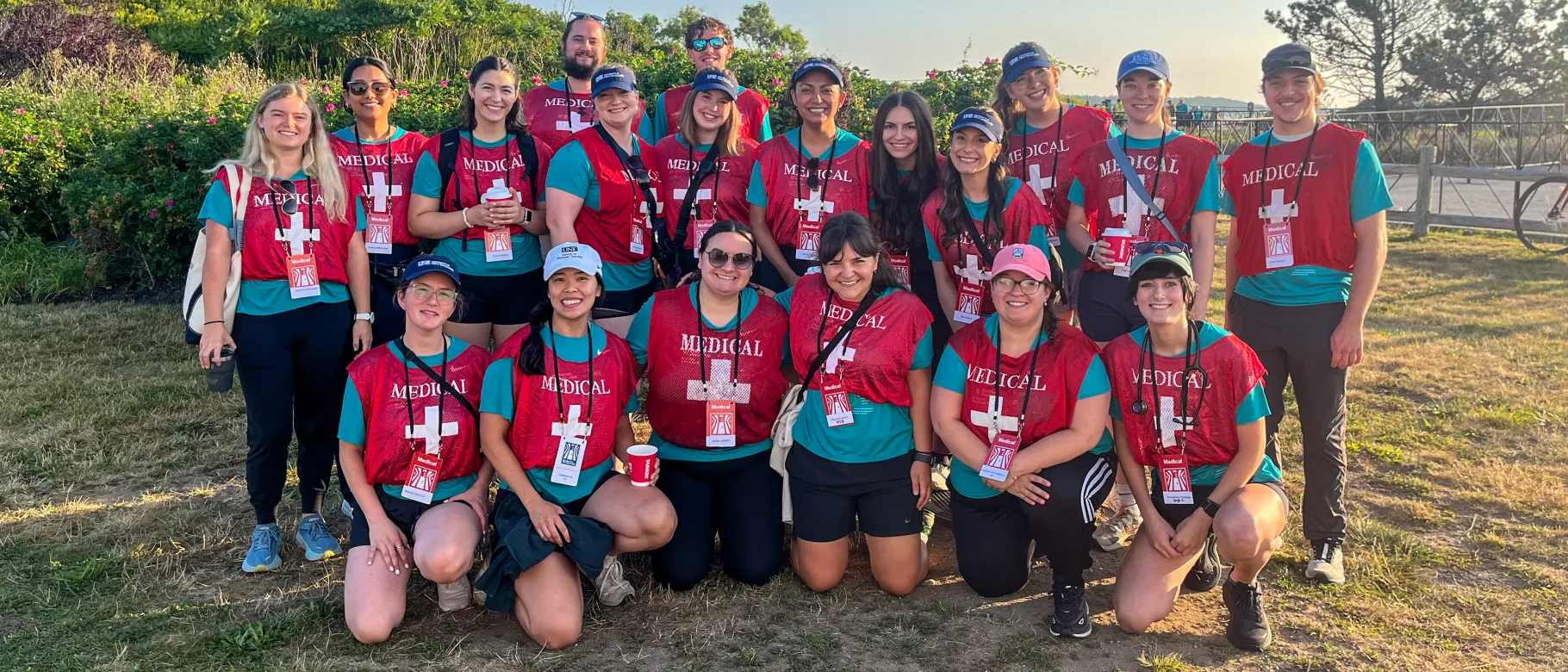 UNE students and volunteers pose at the Beach to Beacon finish line