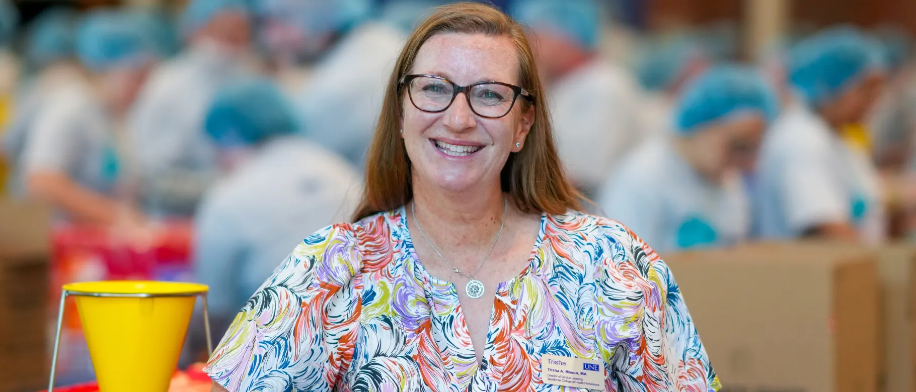 Trisha Mason poses for portrait at 2025 Meals for Maine event