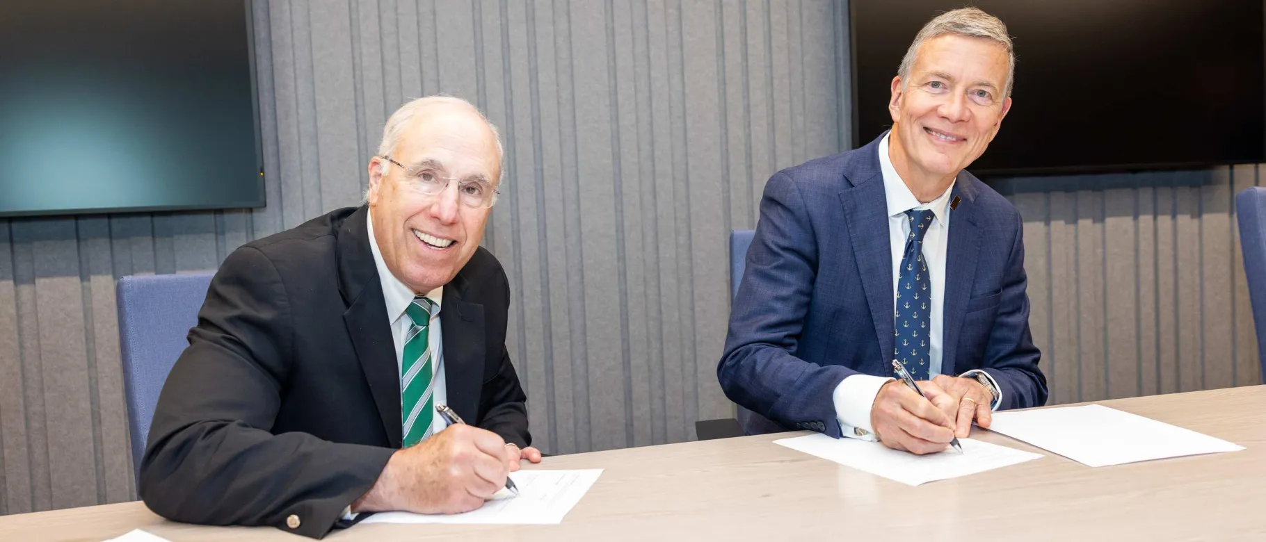 UNE President James Herbert and Babson College President Stephen Spinelli Jr.