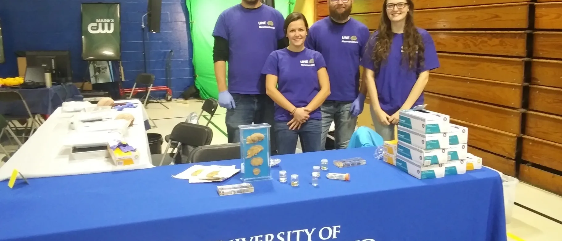 Michael D'Apice, Rachel Russell, Neal Mecum and Katy Lowe get ready for the Portland STEM Expo