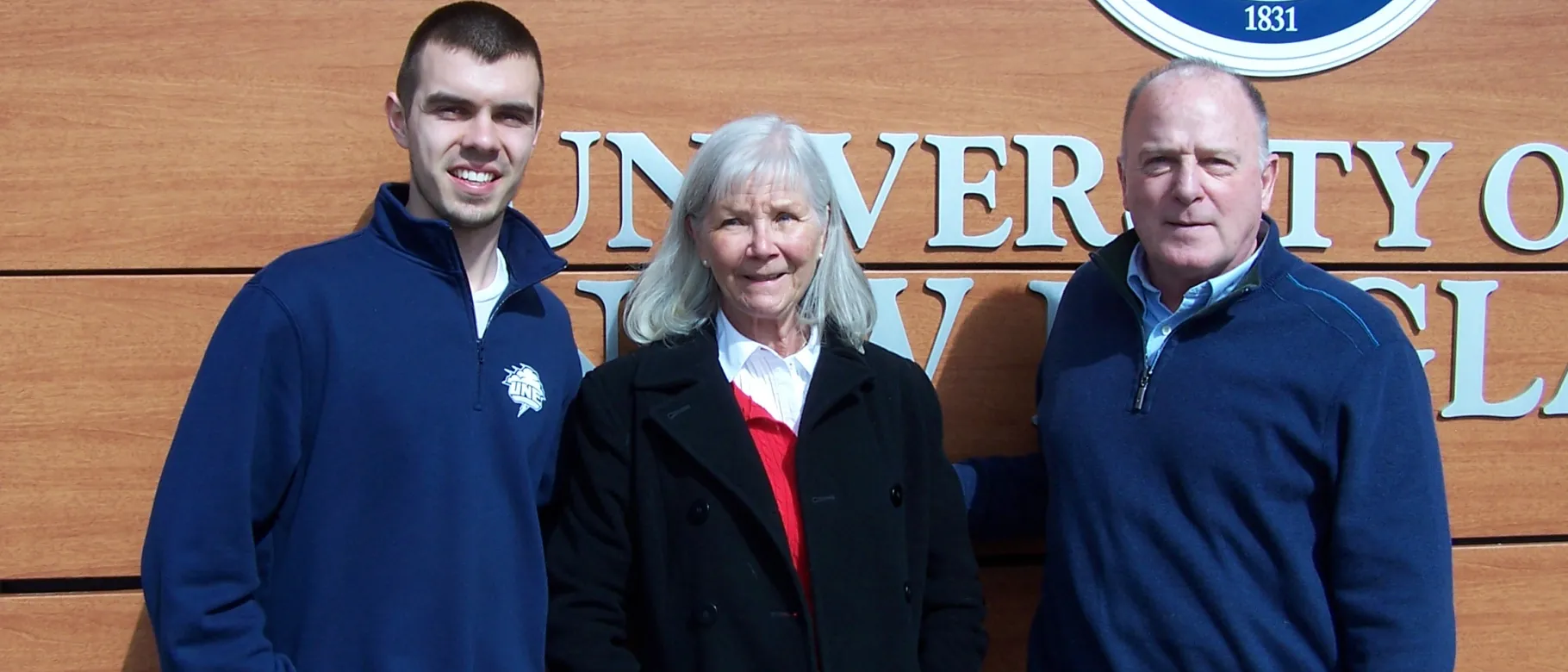 Nathan Oakes with Doug and Susan Biggs