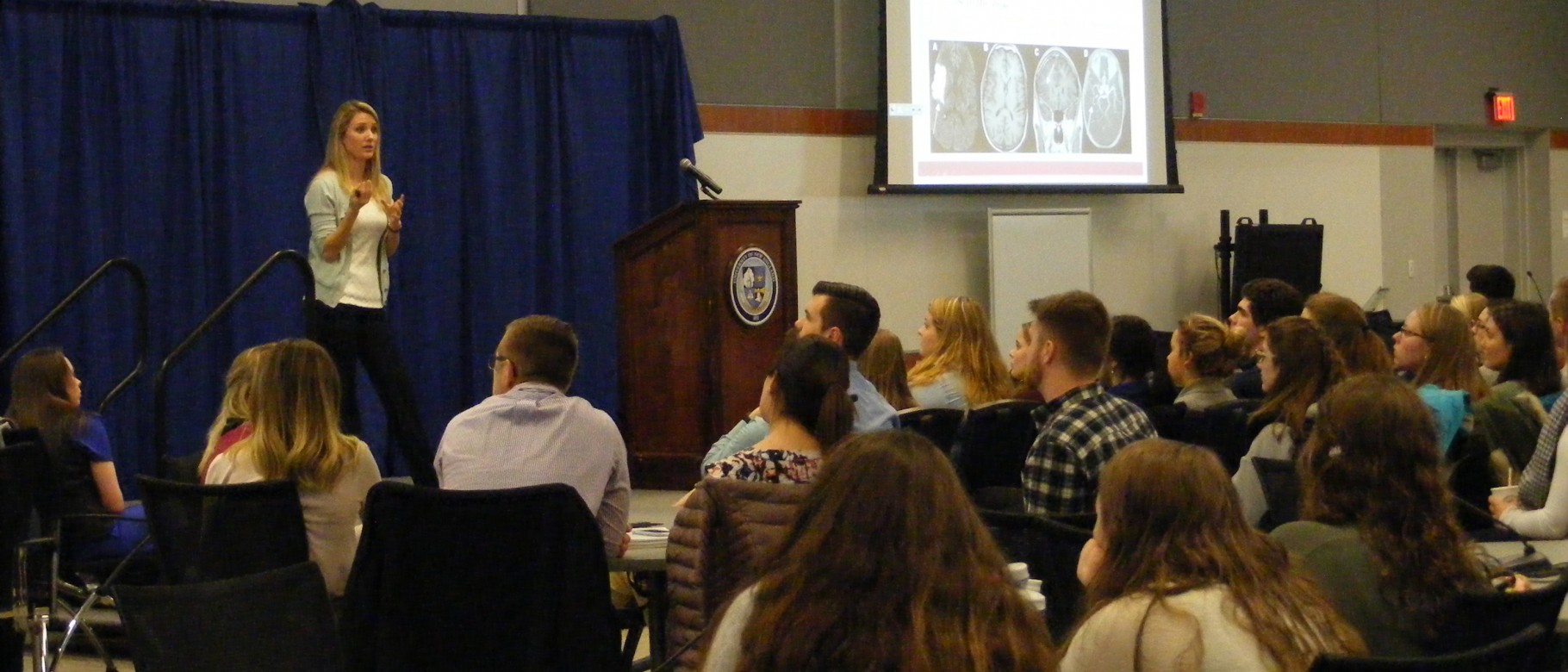Kate Carlson, PharmD ’13, presents a case to UNE undergraduate students