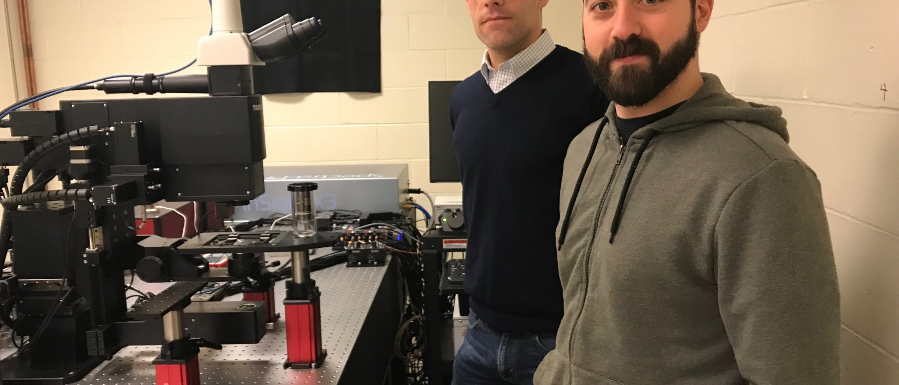 Christoph Straub and Peter Caradonna with UNE's new 2-photon microscope