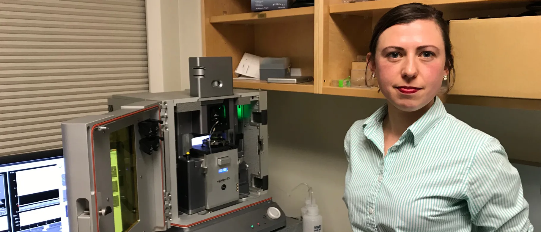 Eve Rose Balog with the state-of-the-art Atomic Force Microscope