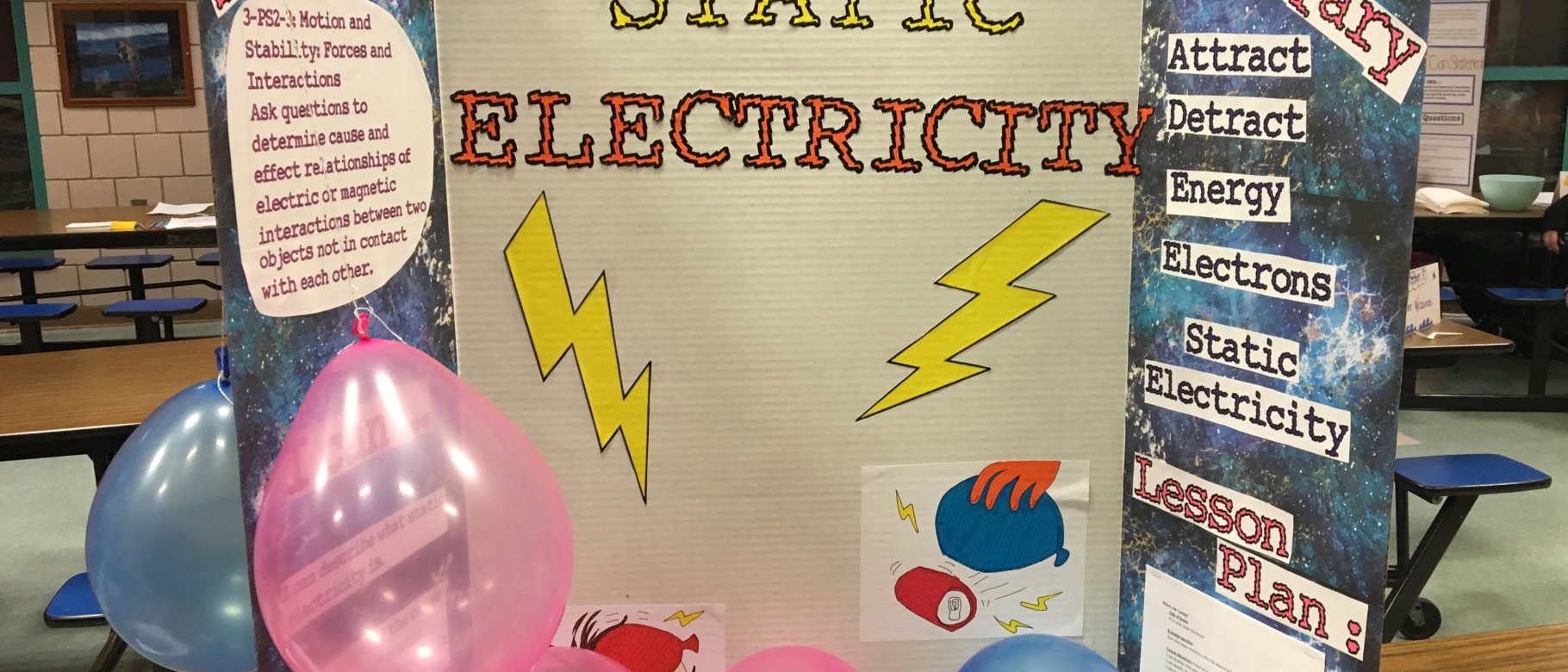 A static electricity learning station, created by UNE education students Summer McGowan and Jessica Loverdi, was one of 12 stati