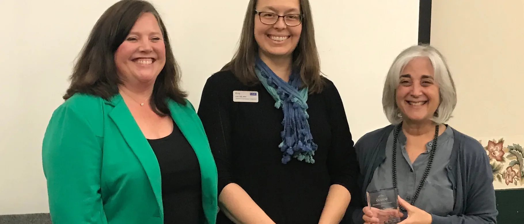 CCSME's Peggy Spencer presented Kris Hall and Shelley Cohen Konrad with the 2019 Innovative Practice Award