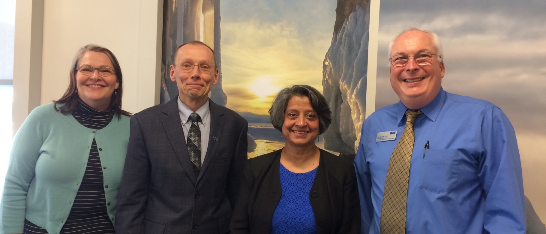 Karen Houseknecht, Michael Sheldon, Piali De and Tom Meuser recently met to discuss UNE's partnership with Senscio Systems 