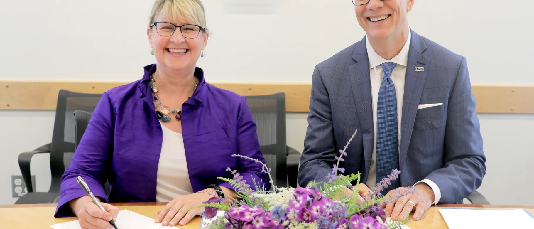 Bigelow Laboratory President and CEO Deborah Bronk and UNE President James Herbert