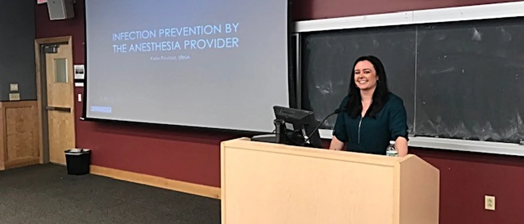 Kara Pavone gives an oral presentation of her project Infection Prevention by the Anesthesia Provider