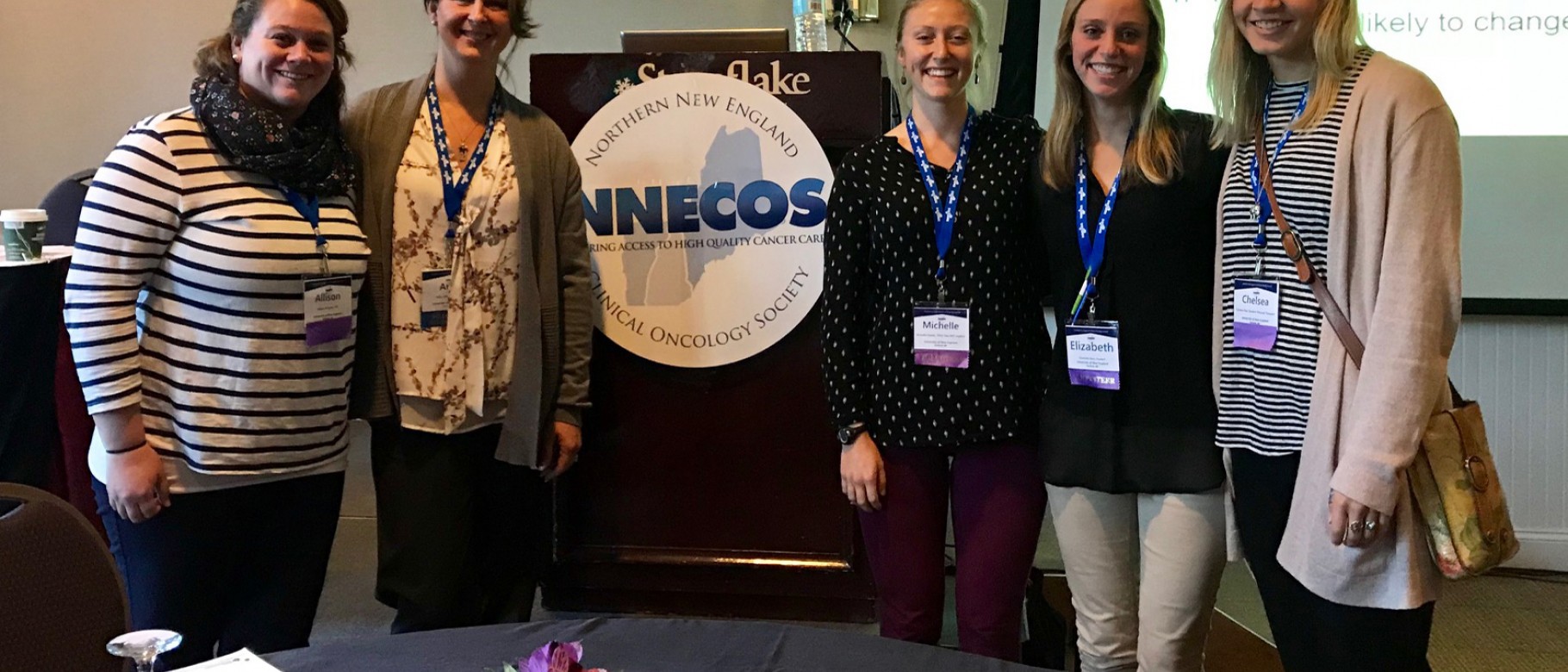UNE Doctor of Physical Therapy students join Amy Litterini at Northern New England Clinical Oncology Society meeting