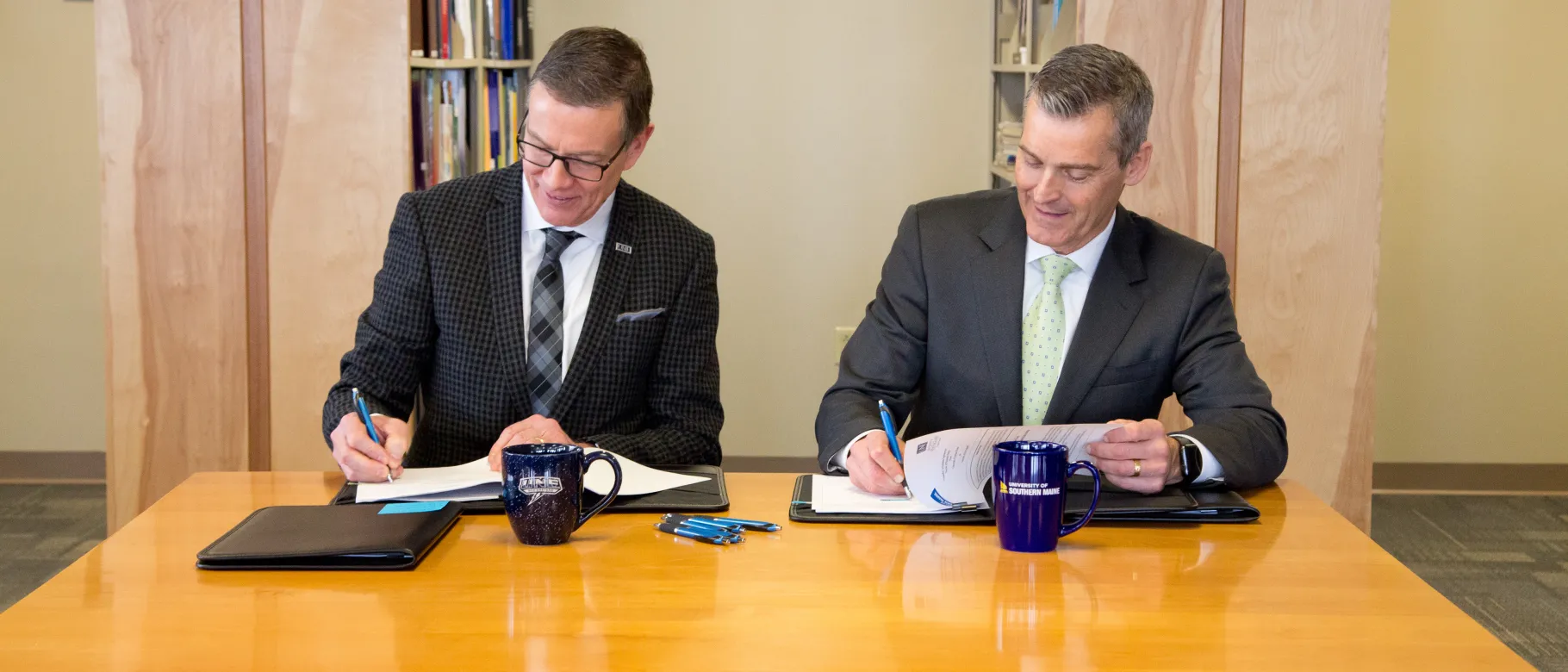 UNE President James Herbert and USM President Glenn Cummings