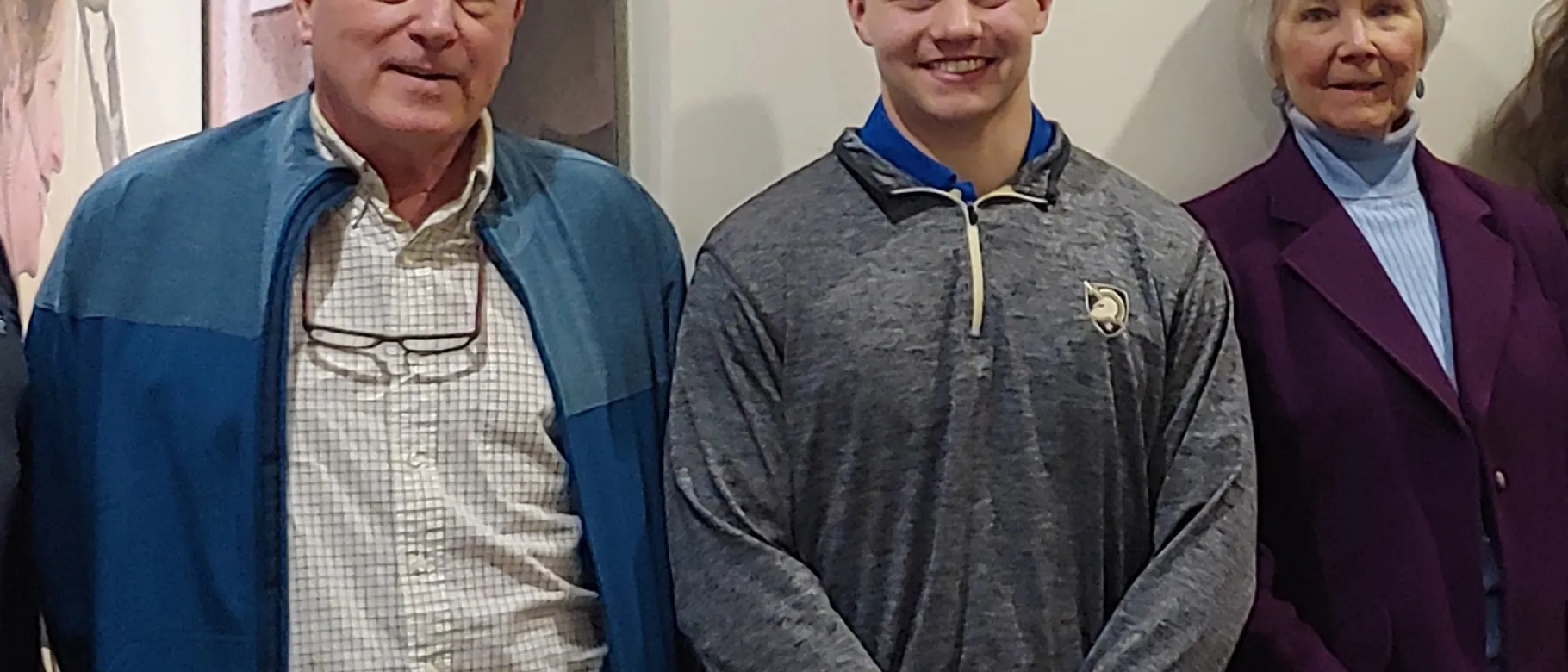 Jesse Hall (center), winner of the Preston Jordan Scholarship, with Doug and Susan (Jordan) Briggs, the scholarship's benefactor