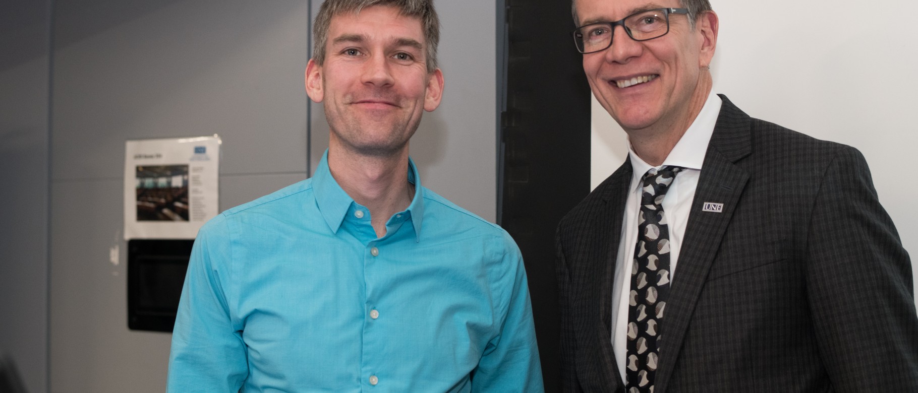 New York Times best-selling author Sam Kean with President James Herbert after his talk at the Connections Lecture Series