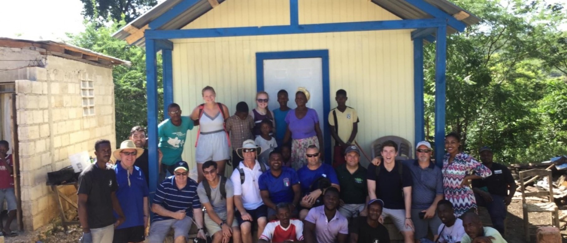 Volunteers with Be Like Brit build a home for a needy family in Haiti over the course of a week