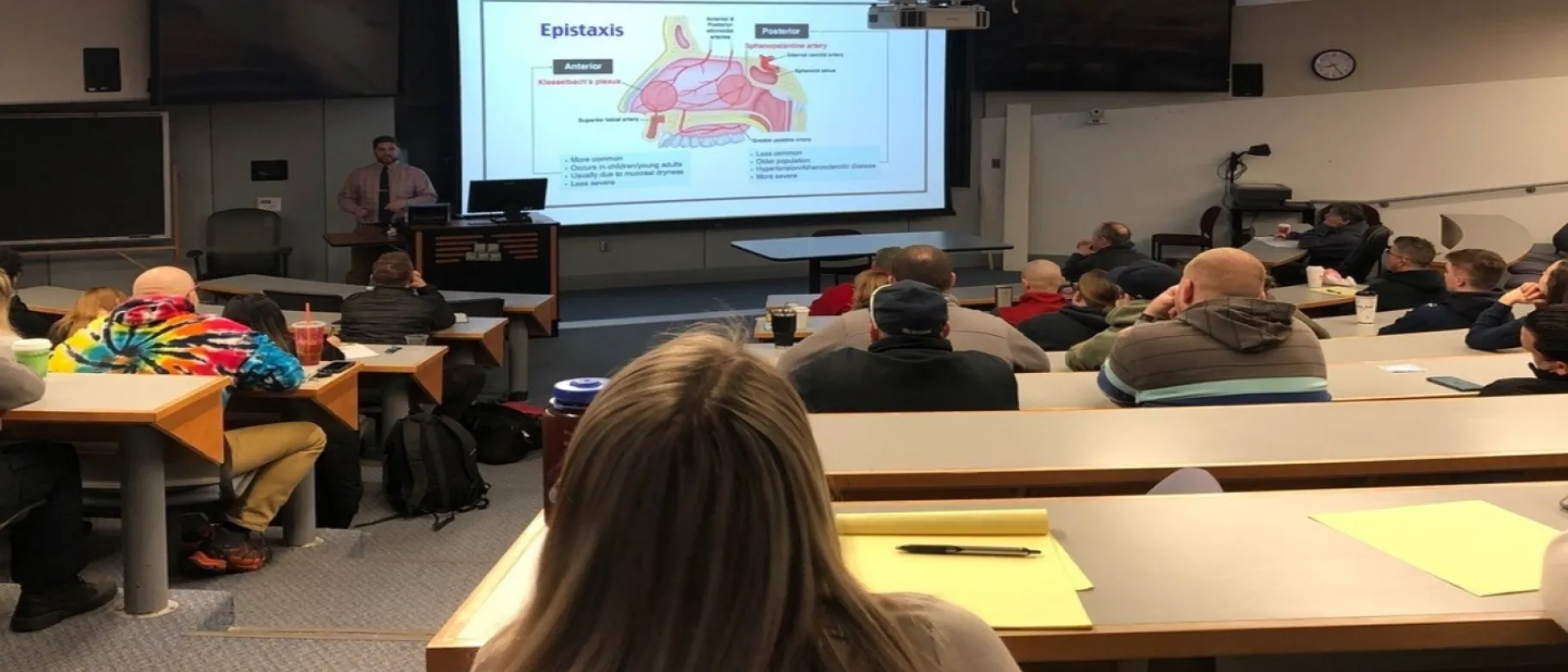 UNE COM students presenting