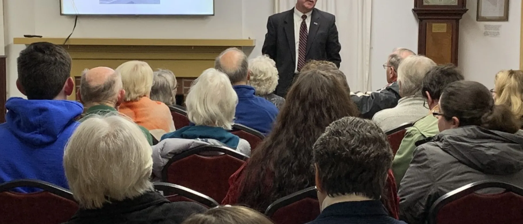 College of Pharmacy Dean Robert McCarthy giving a lecture on American pharmacy history at the Waterville Historical Society