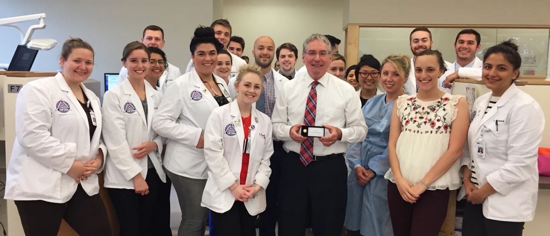 Lionel Vachon and his dental students in the Oral Health Center clinic.