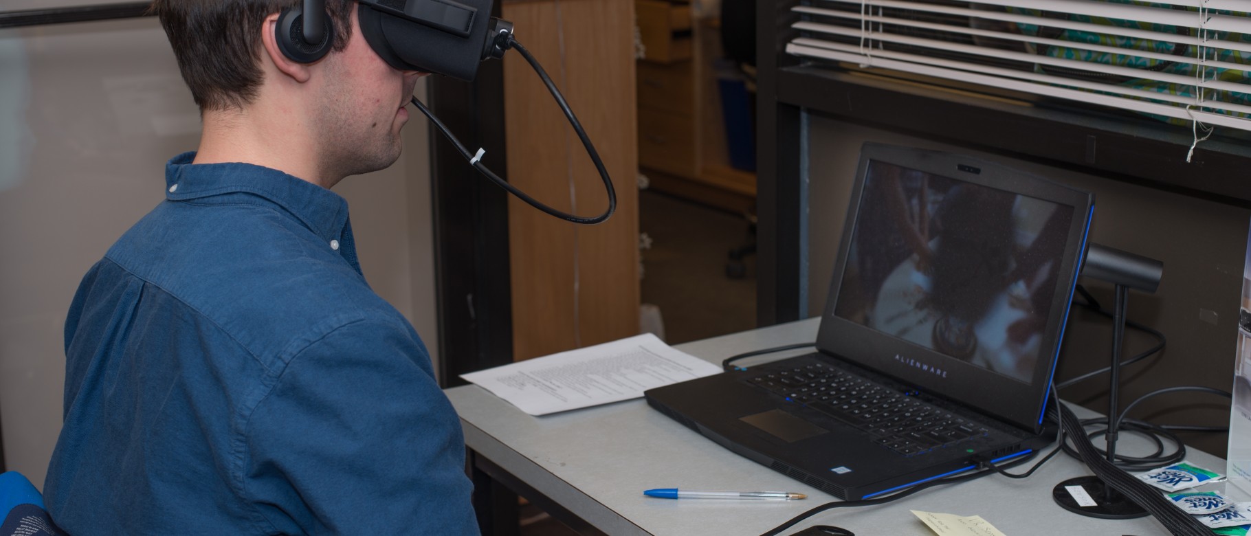 Second-year medical student Matt Rocheleau uses the virtual reality program "We are Alfred.”