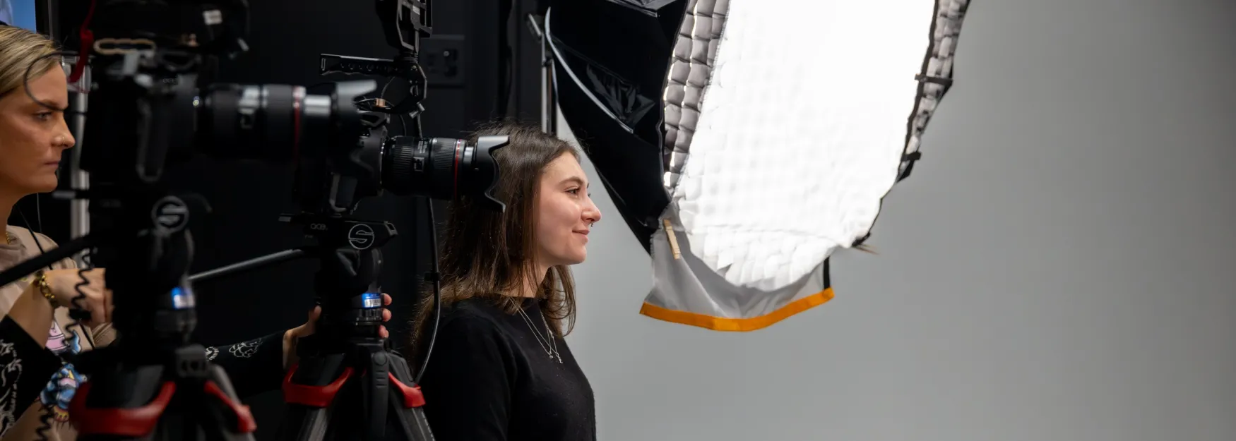 Image of U N E student Emily Hedegard in the Communications and Media Arts Studio