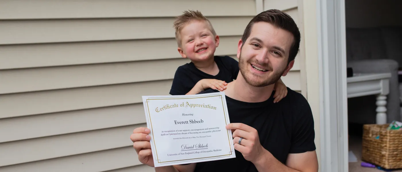 David Shbeeb poses with his son