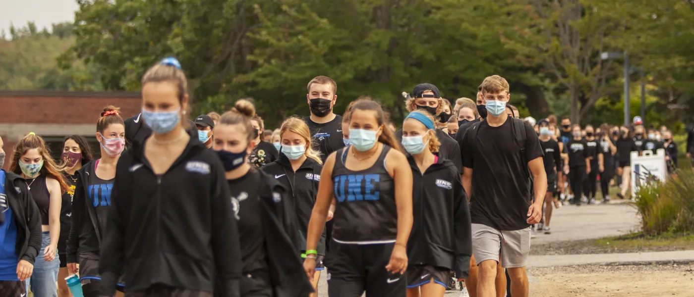 students participate in the march for social justice held on the biddeford campus