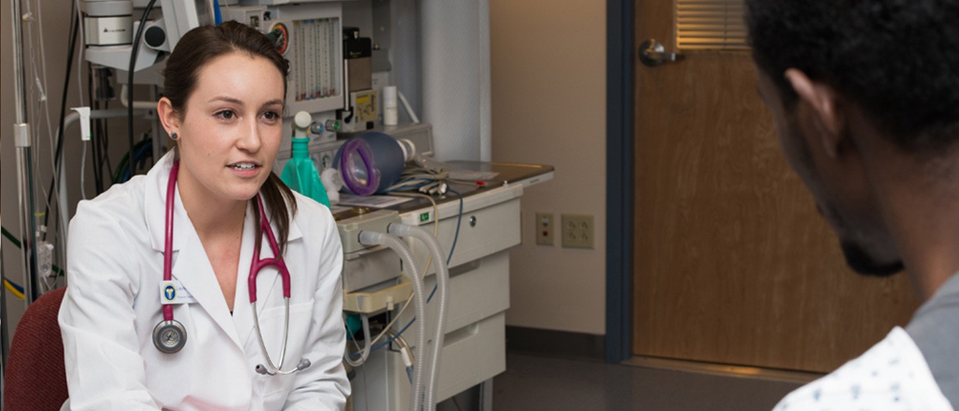 Physician Assistant degree program student providing clinical care.